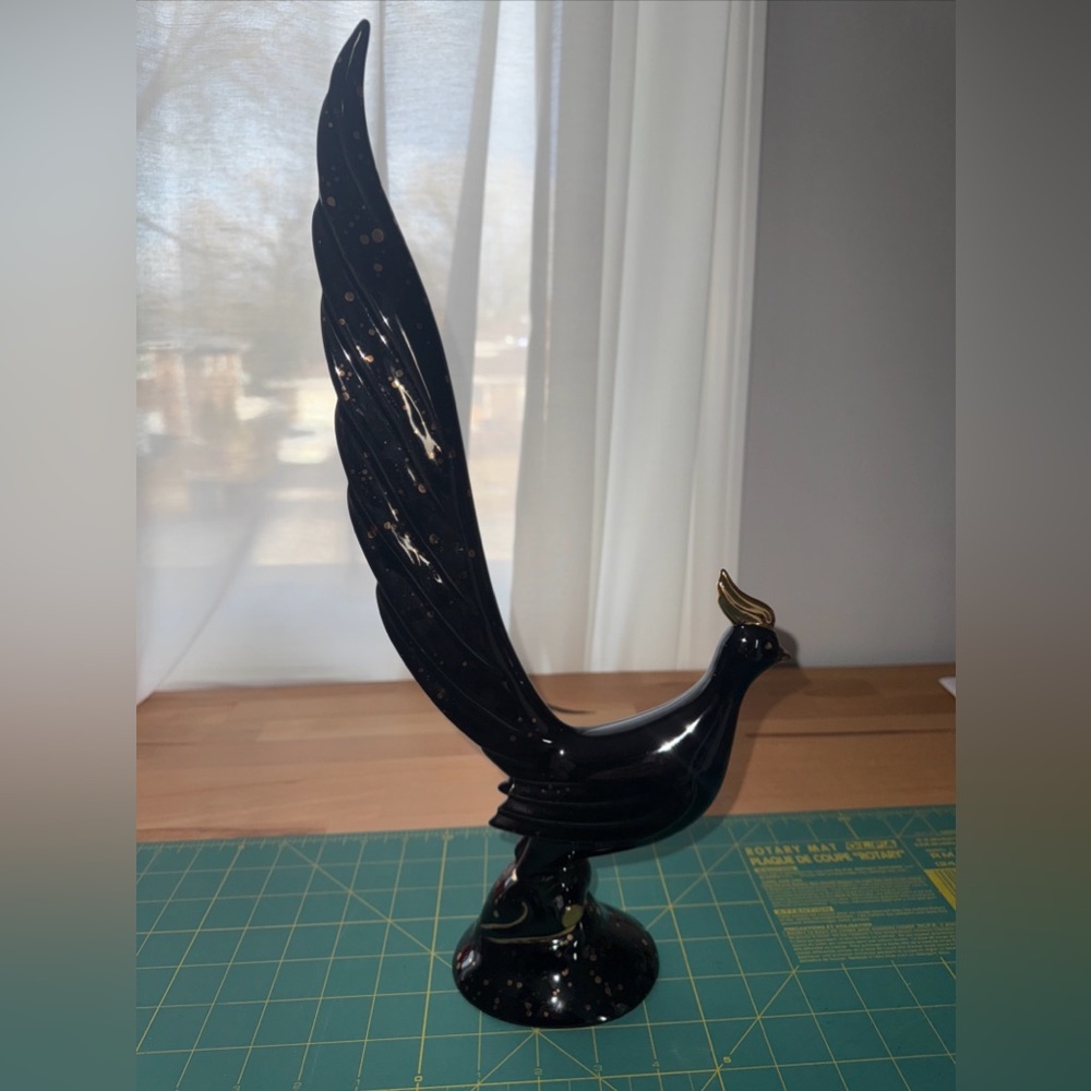 vintage piece from Sutton's Creations, described as a Black & Gold Bird Phoenix